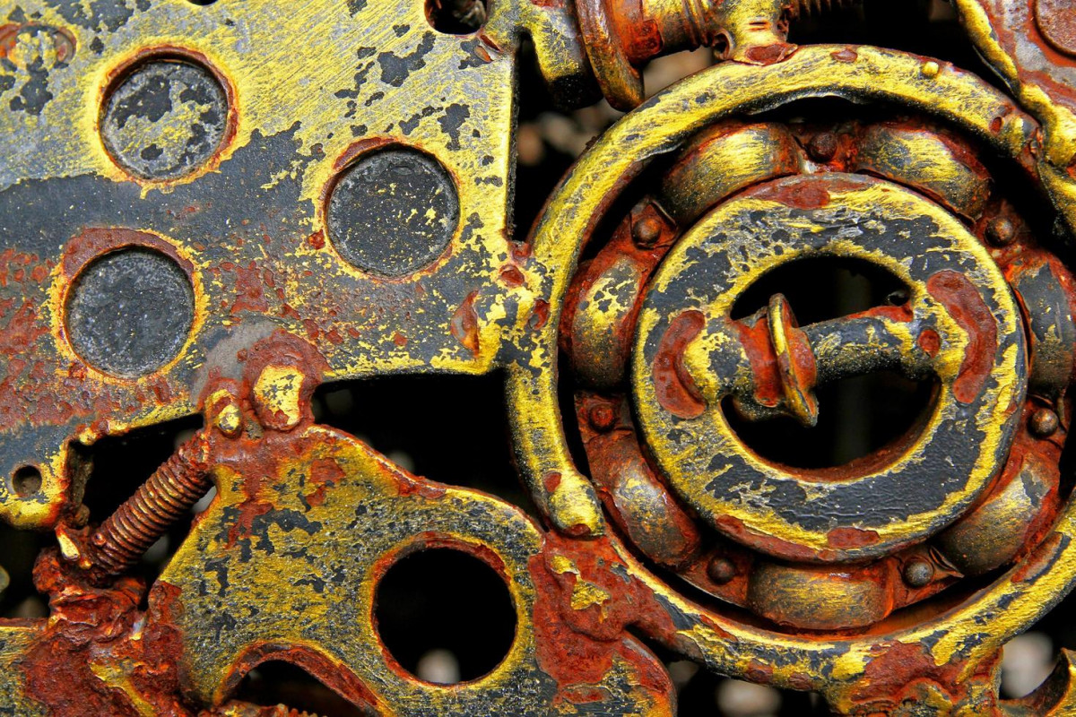 Close up rusty metal nuts and wheel bearing welding together art and abstract background or wallpaper free photo